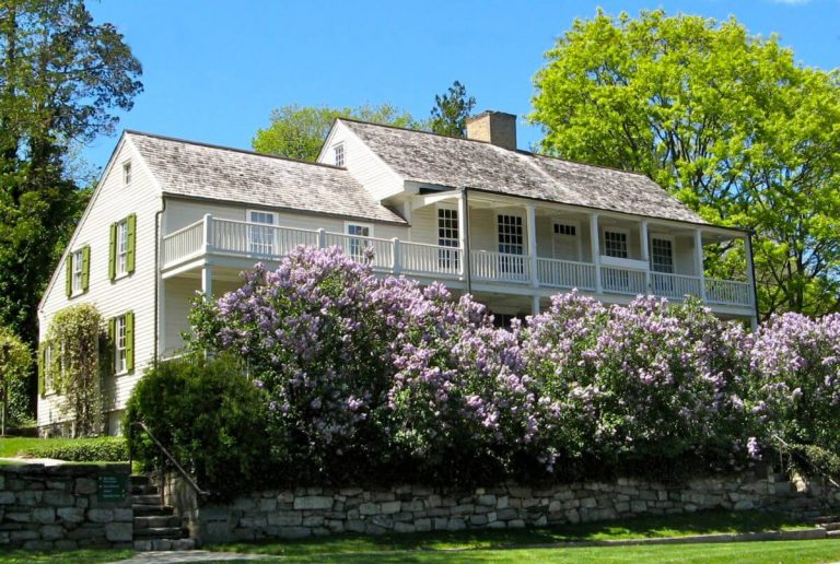 Bush Holley House with lilacs