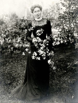 Emma Constant MacRae with flowers
