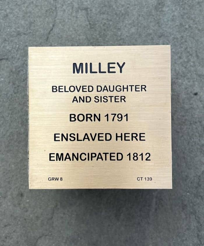 In memory of Milley witness wood stone, birth year, enslavement location, and emancipation.