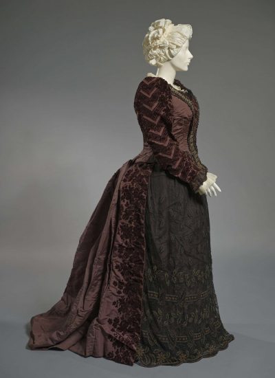 Dinner Dress:
Late 1890s
Silk, cotton, metallic thread, glass beads, metal fasteners
Gift of John Sanna